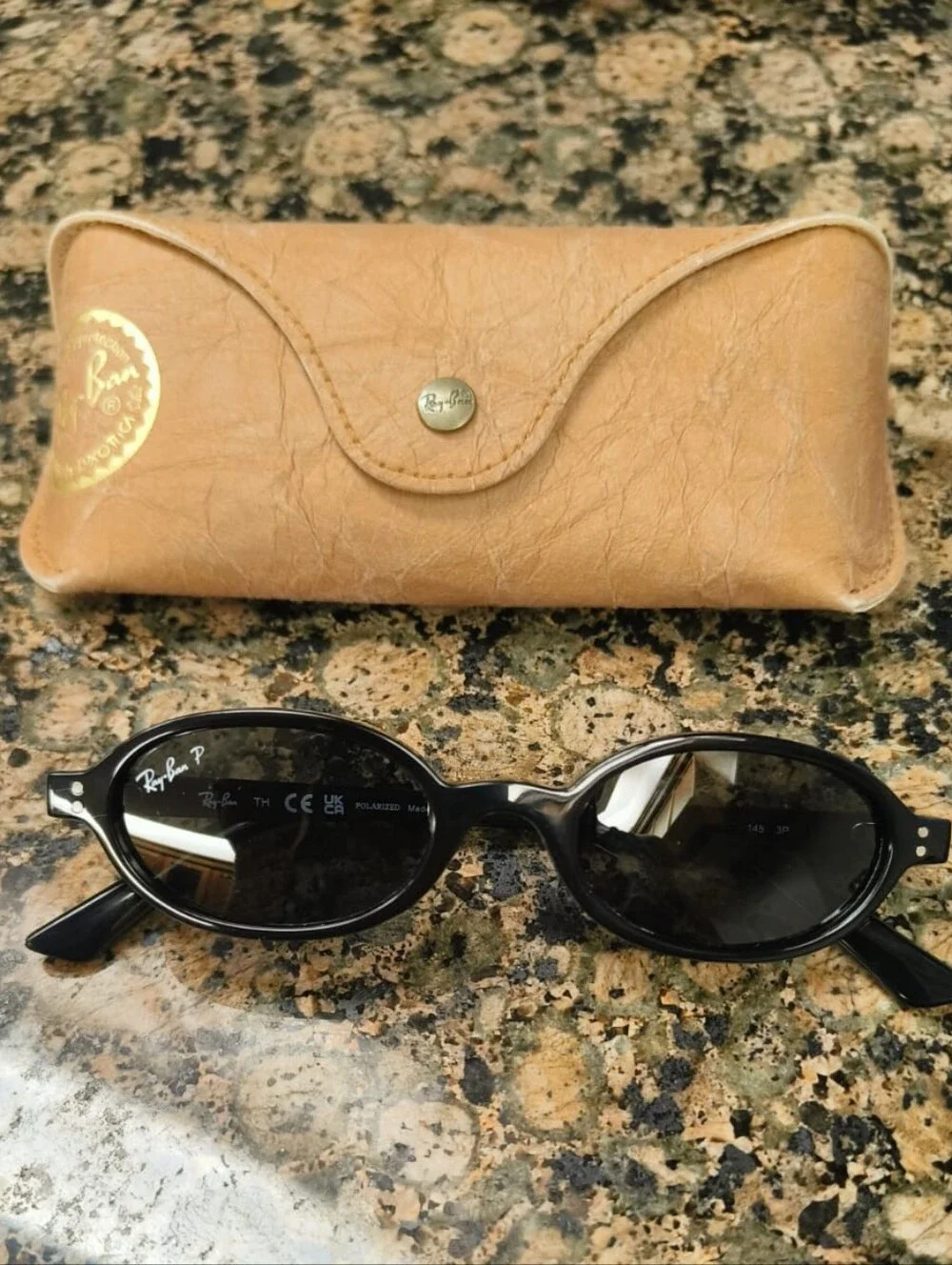 Ray-Ban Black Oval Women's Sunglasses with Tan Case